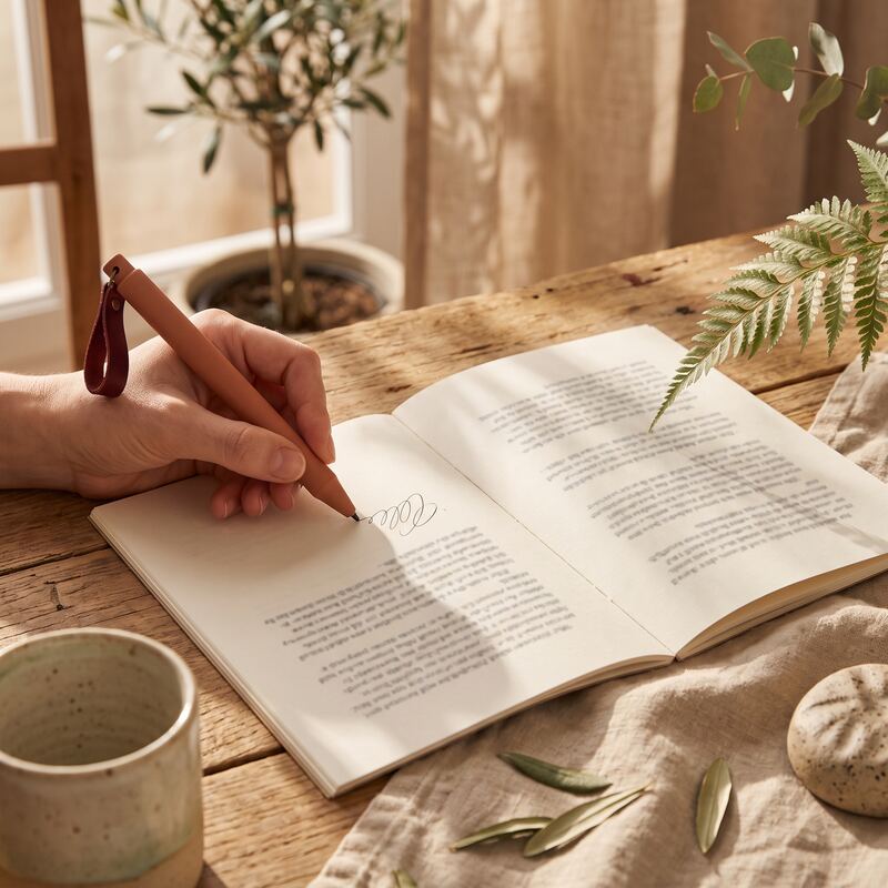 Comparing AI-written marketing copy drafts from Claude and ChatGPT side by side with handwritten review notes Comparing AI-written marketing copy drafts from Claude and ChatGPT side by side with handwritten review notes